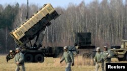 Американские солдаты во время совместных военных учений в Польше. 21 марта 2015 года.