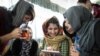 Young Afghan women journalists participate in 'Sahar Speaks' training program in Kabul. March, 2016.