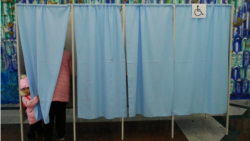 На избирательном участке в Узбекистане в день парламентских выборов. 22 декабря 2019 года.