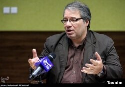 Conservative political analyst Amir Mohebbian.