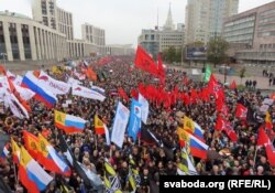 People attend a rally to demand the release of jailed protesters in Moscow on September 29.