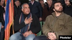 Opposition leader Raffi Hovannisian (left) began his hunger strike in Yerevan's Liberty Square on March 10.