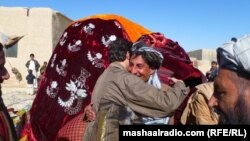 An bridegroom receiving friends to his wedding in southern Afghanistan.