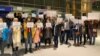 Friends and supporters of Shahab Dehghani, an Iranian student facing deportation from the United States, protesting at Boston's Logan Airport on January 20.