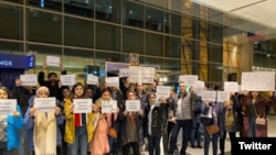 Friends and supporters of Shahab Dehghani, an Iranian student facing deportation from the United States, protesting at Logan Airport. January 20, 2020.