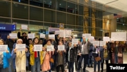 Friends and supporters of Shahab Dehghani, an Iranian student deported from the United States, protesting at Logan Airport. January 20, 2020.