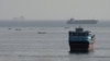 Image shows vessels in the Strait of Hormuz, as seen from Musandam, Oman, on August 3, 2026.