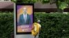 Armenia - A man in Yerevan looks at the campaign billboard of the opposition Bright Armenia Party, May 25, 2021.