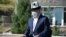 President Sooronbai Jeenbekov attends memorial events for those who have died of COVID-19 at the Ata-Beiit memorial complex in Bishkek on July 30.