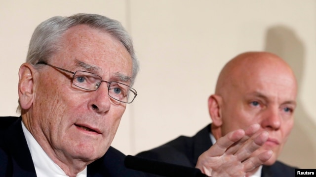 The WADA investigative commission's chairman, Dick Pound (left), said at a press conference at the time that it would be "impossible" for Mutko not to have known about Russia's doping program.