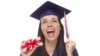 Shutterstock. Happy Female Graduate in Cap and Gown Holding Stack of Gift Wrapped Hundred Dollar Bills.