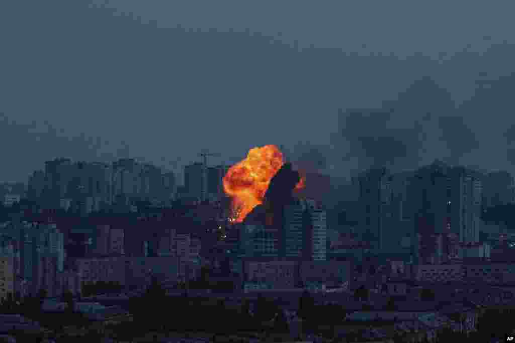 An explosion is seen after a Russian air strike on Kyiv on June 6.