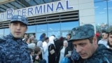 Law enforcement officers maintain a heavy presence at the airport in Makhachkala, Daghestan, on October 31, days after a mob of some 1,000 people shouting anti-Semitic slogans stormed the facility looking to block entry to "refugees from Israel."