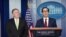 U.S. Secretary of State Mike Pompeo (left) and Treasury Secretary Steven Mnuchin announce the new sanctions at the White House.