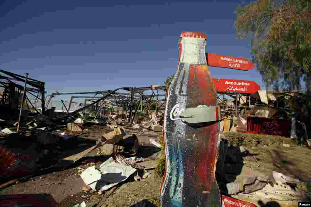 A Coca-Cola beverages factory after Saudi-led air strikes destroyed it in Yemen's capital, Sanaa, on December 30. (Reuters/Khaled Abdullah)