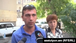 Armenia - Vaghinak Shushanian and his mother. Yerevan, 25Jul, 2014 