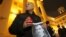 Mikalay Statkevich attends a rally to commemorate victims of Stalin's political repressions outside KGB headquarters in Minsk on October 29.