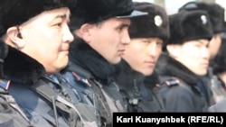 Police were on hand to keep a close eye on the opposition demonstration in Almaty on February 25.