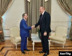 President Ilham Aliyev (right) meeting with Ramiz Mehdiyev in October 2019.