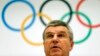 International Olympic Committee President Thomas Bach announces the 2022 Olympic Winter Games candidate cities at IOC headquarters in Lausanne on July 7, 2014.