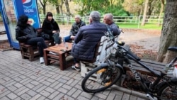 'Life On Every Street': Ukrainians In Kherson Welcome Cease-Fire In Nearby Oleshky