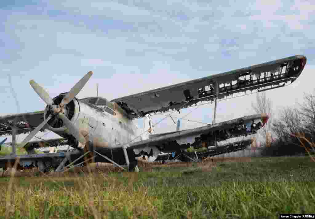 A tattered Antonov An-2 in the base. A local pilot who once flew at the school said&nbsp;he watched as the airstrip, with its &quot;steel grandmas,&quot; fell into disrepair. &quot;Day after day, we watched as everything died. It was terribly sad.&quot;