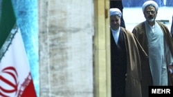 Ali Akbar Hashemi Rafsanjani (left), the "Shark" of Iranian politics