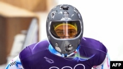 In a statement on February 12, the IOC ruled that the helmet Vladyslav Heraskevych intended to wear -- which featured images of Ukrainian athletes killed in Russia's invasion -- did not meet competition rules.