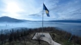 Flag of Bosnia and Heryegovina over Sarajevo