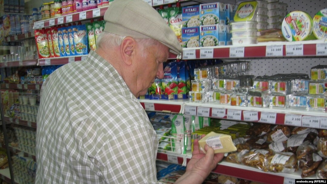 Ivan Antanyuk says his real income has shrunk to less than a third of what it was before a devastating financial crisis struck Belarus in March.