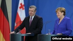 გიორგი კვირიკაშვილი, ანგელა მერკელი