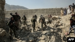 د پاکستان په بریدونو کې یوه ړنګه شوې کلا 