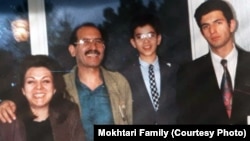 A family photo of Iranian writer and poet Mohammad Mokhtari (2nd L).