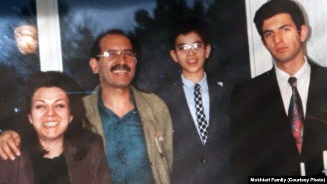 A family photo of Iranian writer and poet Mohammad Mokhtari (2nd L) who is a victim of chain political murder in Iran in the late 90s.