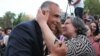 Armenia - Opposition leader Raffi Hovannisian is embraced by a supporter during an election campaign event in Yerevan, 1May2012.