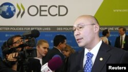 Кайрат Келимбетов, вице-премьер Казахстана, в день отбора претендентов на право проведения EXPO. Париж, 22 ноября 2012 года.