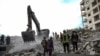 Raščišćavanje ruševina u gradu Idlib