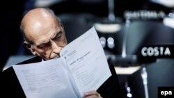 A member of Azerbaijan's delegation prepares for the second day of the Climate Summit in Copenhagen on December 8.