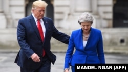 Премьер-министр Британии Тереза Мэй и президент США Дональд Трамп. Лондон, 4 июня 2019 года.