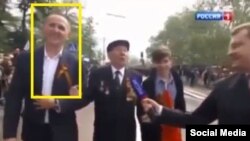 Кадр із програми російського телеканалу, на якому видно главу вінницької поліції Антона Шевцова на параді в Севастополі