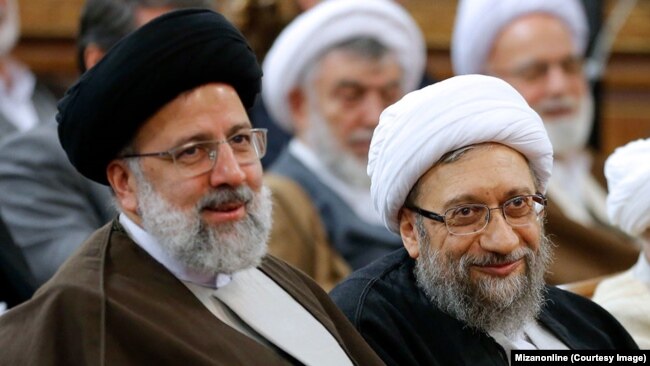 Current judiciary chief Ebrahim Raisi (left) with Sadegh Amoli Larijani earlier this year.
