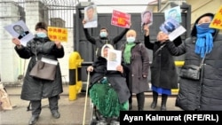 Demonstrators outside the Chinese Consulate in Almaty demand the release of relatives in Xinjiang on February 9.
