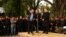 "Железный Алик" показал на яростном митинге оппозиции в нынешнем феврале, что может "держать удар", но на определенные уступки ему нынче пришлось пойти