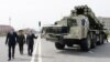 Azerbaijan - President Ilham Aliyev (L) inspects a Russian-made Smerch multiple-launch rocket system deployed in Nakhichevan, 7Apr2014.