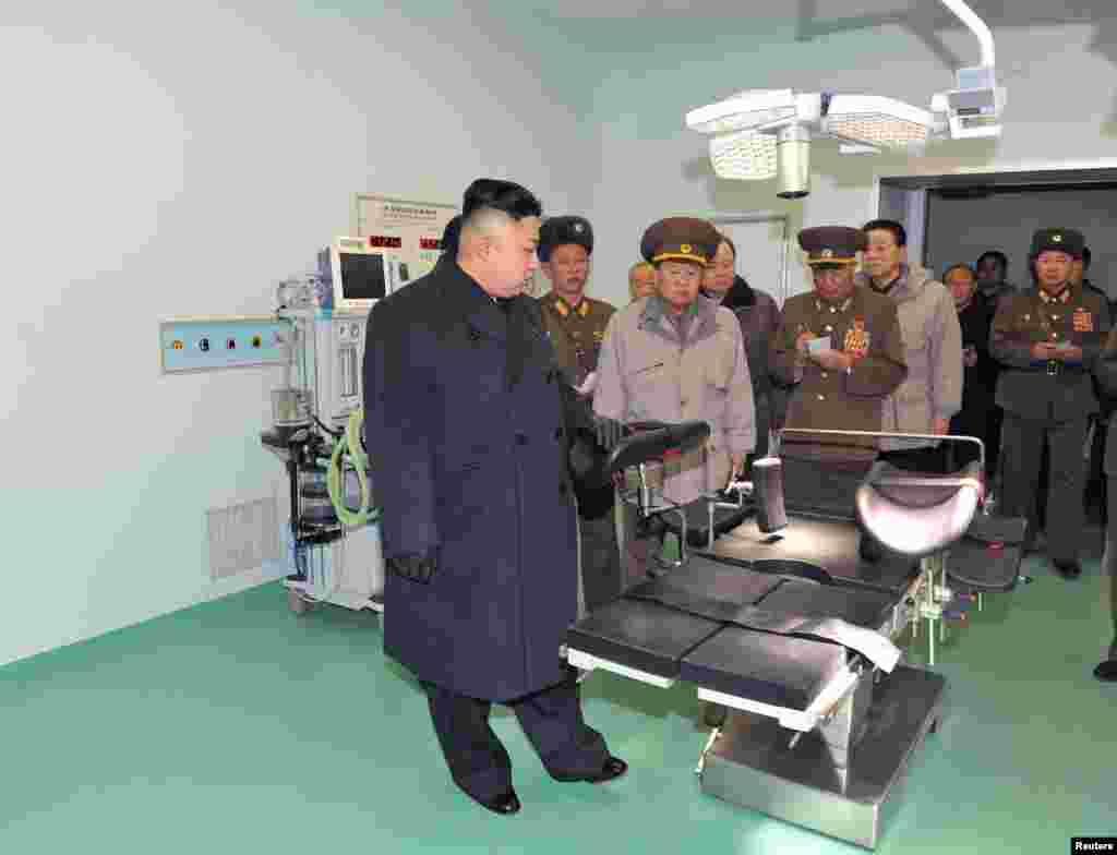 North Korean leader Kim Jong Un (front) visits the Taesongsan General Hospital being built by the People's Army in Pyongyang in this picture released by North Korea's KCNA news agency. KCNA said the hospital covers a total plot of more than 100,000 square meters and has three sick wards. (Reuters/KCNA)