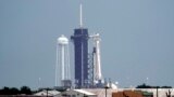 U.S. -- The SpaceX Falcon 9, with the Crew Dragon spacecraft on top of the rocket, sits on Launch Pad 39-A, at Kennedy Space Center in Cape Canaveral, Florida, May 27, 2020