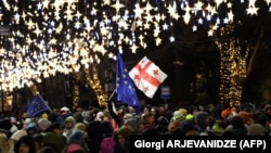 Anti-government demonstrators have been protesting every night on the streets of Tbilisi for more than three weeks. 