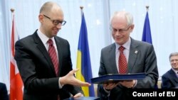 Голова українського уряду Арсеній Яценюк і голова Європейської ради Герман Ван Ромпей сьогодні в Брюсселі, 21 березня 2014 року