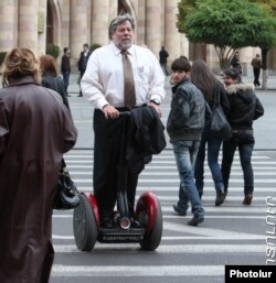 Armenia - Steve Wozniak, co-founder of Apple Inc., rides a segway in dowontown Yerevan, 10Nov2011.