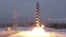 Russia's new Sarmat intercontinental ballistic missile blasts off during a test launch from an undisclosed location in Russia.
